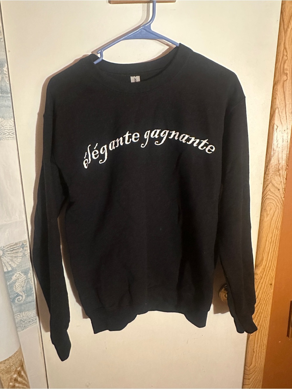 Black Elegante Gagnante Crewneck Sweater with White Script